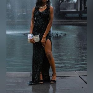 sequin covered black prom dress with slit